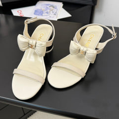 MID HEEL SANDALS IN WHITE CALFSKIN WITH BOW