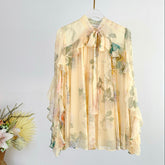 SHEER CHIFFON BLOUSE IN WARM BEIGE WITH RUFFLED COLLAR AND BOW