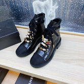 CC COMBAT BOOTS IN BLACK WRINKLED CALFSKIN AND GROSGRAIN WITH FAUX PEARL