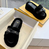 THICK-SOLDED SLIPPER IN BLACK LAMB FUR