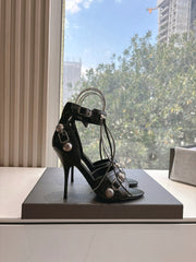 CAGOLE HIGH-HEEL SANDALS IN BLACK LAMBSKIN