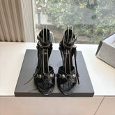 CAGOLE HIGH-HEEL SANDALS IN BLACK LAMBSKIN