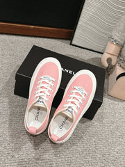 LACE-UP SNEAKERS IN PASTEL PINK CANVAS