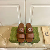 GG SANDAL WITH ROUND INTERLOCKING G IN CARAMEL BROWN CALFSKIN