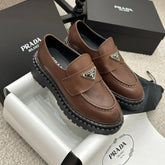 PRADA 25S LOAFER 50MM IN DARK BROWN CALFSKIN LOGO