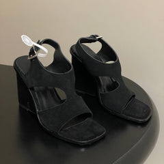HM 25S KALYA WEDGE SANDAL 100 MM IN BLACK SUEDE