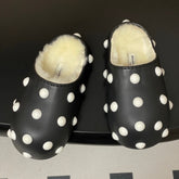 BALENCIAGA 25S FUR-LINED MULES IN BLACK AND WHITE FAUX LEATHER