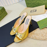 GG Women's Horsebit mid-heel slide sandal in Gold