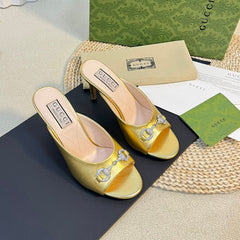 GG Women's Horsebit mid-heel slide sandal in Gold