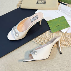 GG Women's Horsebit mid-heel slide sandal in glossy White leather