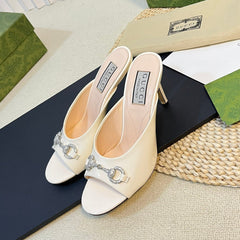 GG Women's Horsebit mid-heel slide sandal in glossy White leather