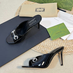 GG Women's Horsebit mid-heel slide sandal in glossy black leather