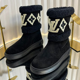 SNOWDROP FLAT ANKLE BOOTS IN BLACK SUEDE