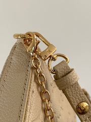EASY POUCH ON STRAP 19 IN BEIGE MONOGRAM EMPREINTE LEATHER