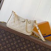 EASY POUCH ON STRAP 19 IN BEIGE MONOGRAM EMPREINTE LEATHER