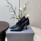 CURVED HEEL DEEP MOUTH PUMPS IN BLACK CALFSKIN