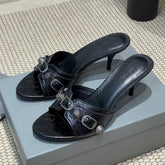 CAGOLE HIGH MULES IN BLACK OIL-WAX SHEEPSKIN