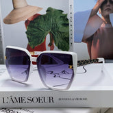 TRIOMPHE SUNGLASS 497829 IN WHITE ACETATE EMBOSSED LOGO