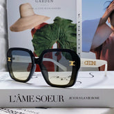 TRIOMPHE SUNGLASSES 548593 IN BLACK AND WHITE ACETATE