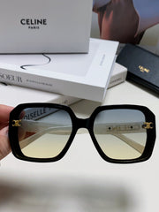 TRIOMPHE SUNGLASSES 548593 IN BLACK AND WHITE ACETATE