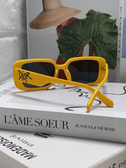 MONTAIGNE SUNGLASS 571593 IN YELLOW ACETATE TEXT LOGO