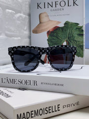 MONOGRAM SUNGLASS 581386 IN BLACK ACETATE FRAME