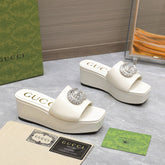 HIGH WEDGE PLATFORM WITH DOUBLE G IN WHITE GLOSSY CALFSKIN