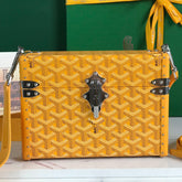 CASSETTE TRUNK BAG 21 IN YELLOW GOYARDINE CANVAS & CLAMECY COWHIDE