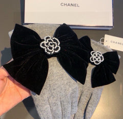 GLOVES IN DOVE GRAY WOOL WITH LARGE BLACK BOW 464994