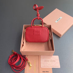 MICRO BAG KEYCHAIN 11 IN TALL POPPY RED CALFSKIN EMBOSSED LOGO