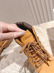 CELINE 25S MARTIN BOOTS IN MEDIUM ORANGE CALFSKIN