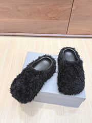 BALENCIAGA 25S MULES IN BLACK FAUX FUR