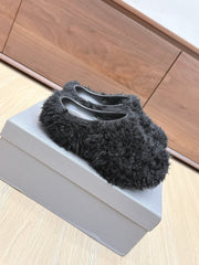 BALENCIAGA 25S MULES IN BLACK FAUX FUR
