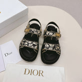 DIOR BACK-STRAP SANDALS 25S IN BLACK AND GOLD CALFSKIN WITH BUTTERFLY MOTIF