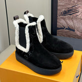 ASPEN CHELSEA ANKLE BOOTS IN BLACK MONOGRAM-DEBOSSED SUEDE