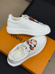 TIME OUT SNEAKER IN WHITE EMBOSSED MONOGRAM CALFSKIN