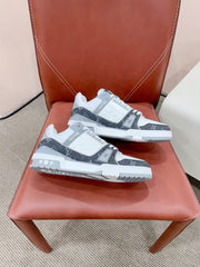 LV TRAINER SNEAKER IN WHITE CALFSKIN AND BLACK MONOGRAM DENIM