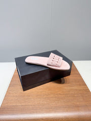 ALAIA FLAT SANDALS WITH PERFORATED STRAPS 25S IN LIGHT PINK SUEDE