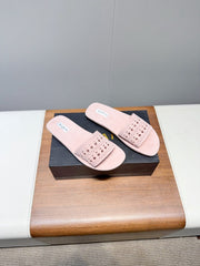 ALAIA FLAT SANDALS WITH PERFORATED STRAPS 25S IN LIGHT PINK SUEDE