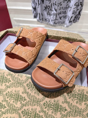 SANDALS IN BURNT ORANGE SUEDE EMBOSSED LOGO SILVER HARDWARE
