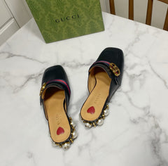 GG HEEL MULES 35 CM IN BLACK CALFSKIN WITH PEARL-EMBELLISHED SOLE