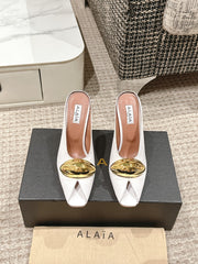 ALAIA SPIKE JEWEL MULES IN WHITE CALFSKIN WITH GOLD HARDWARE
