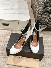 ALAIA ROUND-TOE HIGH HEELS 10 CM IN WHITE CALFSKIN