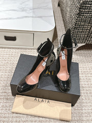 ALAIA ROUND-TOE HIGH HEELS 10 CM IN BLACK CALFSKIN