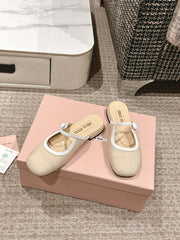 FLAT MULE IN BISQUE BEIGE PATENT CALFSKIN