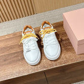 MM SNEAKERS IN WHITE CALFSKIN WITH YELLOW LACES