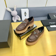 LOAFER WITH TRIANGLE LOGO IN CHOCOLATE BROWN CALFSKIN