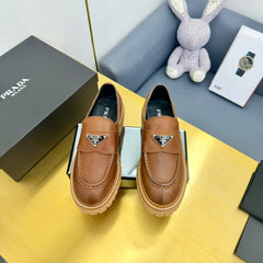 LOAFER WITH TRIANGLE LOGO IN COGNAC CALFSKIN