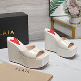 ALAIA PLATFORM WEDGE IN WHITE TAN LAMBSKIN WITH RED HEART