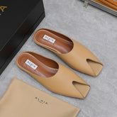 ALAIA FLAT MULE IN SEPIA TAN LAMBSKIN